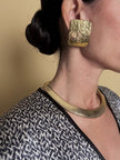 Maxi clip oro con logo “Yves Saint Laurent”