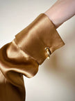 Blusa vintage Baila in seta bronzo con dettaglio gioiello nei polsi