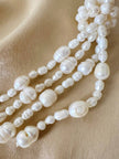 Collana lunga con nappa realizzata con perle naturali d’acqua dolce