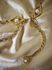 Cintura gioiello in metallo oro con perle cabochon