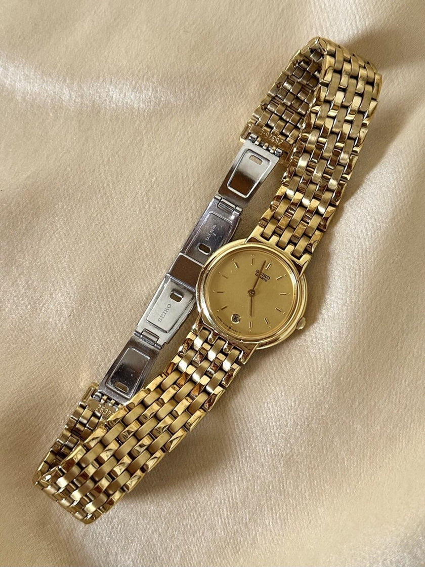 Orologio dorato con cinturino a bracciale “Seiko”