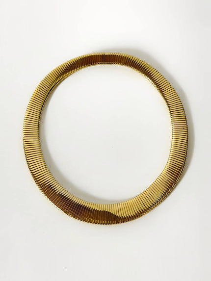 Collier tubogas vintage Cascio in metallo dorato