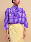 Blusa in seta lilla con maxi fiocco