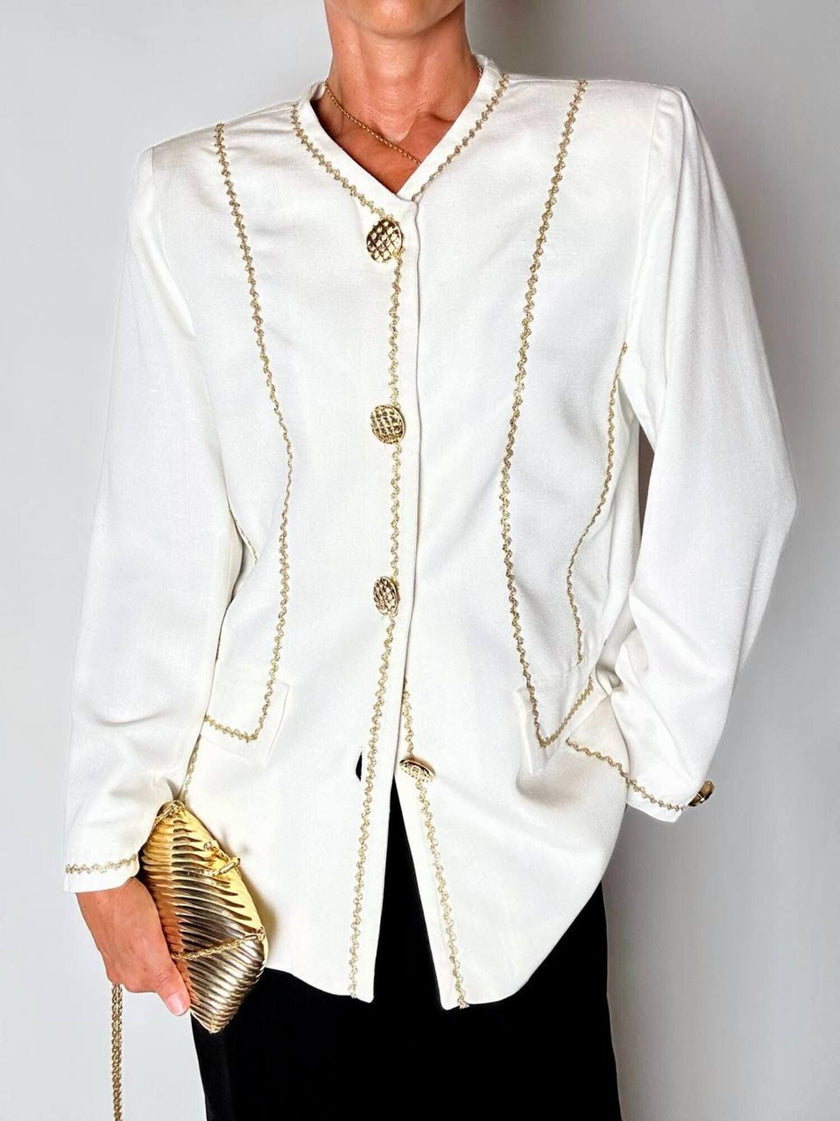 Giacca vintage Yves Saint Laurent bianco latte con serpentine dorate e bottoni gioiello