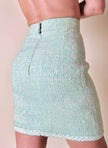 Tailleur sartoriale haute couture in tweed verde acqua marina con maxi bottoni gioiello