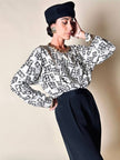 Blusa Yves Saint Laurent in tessuto jacquard bianco e nero fantasia Domino