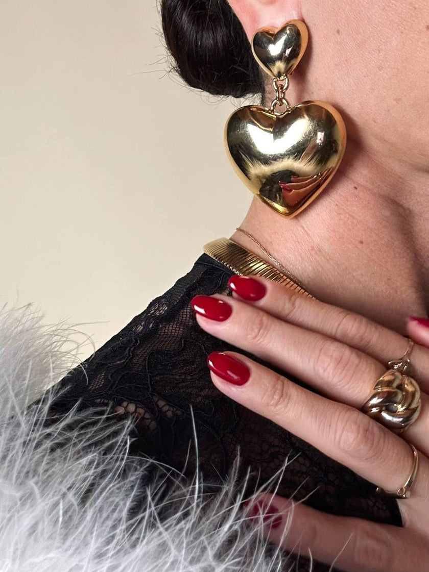 Maxi clip oro con cuori pendenti “Moschino”