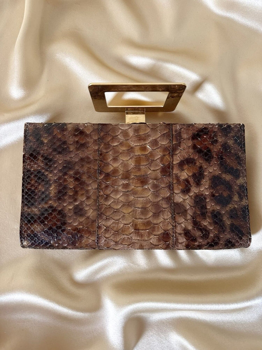 Vintage Roger Vivier leopard-print python clutch with a distinctive rectangular gold-tone metal clasp