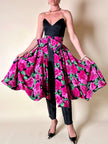 Gonna a ruota in seta fantasia floreale fucsia con maxi fiocco