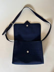 Borsa messenger in tessuto plastificato e pelle blu “Yves Saint Laurent”