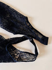 Jumpsuit con staffe in pizzo nero “La Perla”