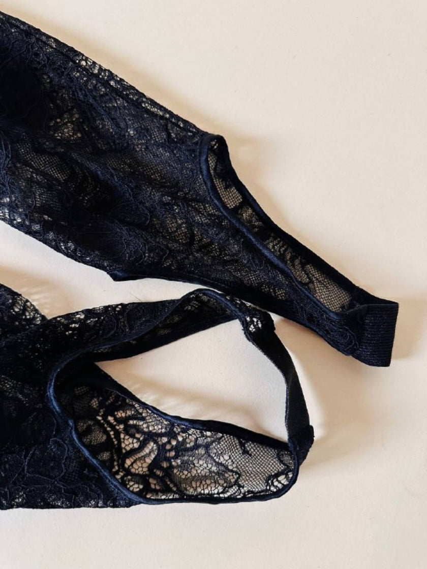 Jumpsuit con staffe in pizzo nero “La Perla”