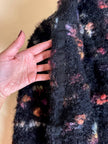 Cardigan in lana bouclé nera con lavorazione bottonata multicolor