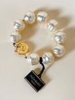 Bracciale di perle barocche con chiusura dorata “Yves Saint Laurent”