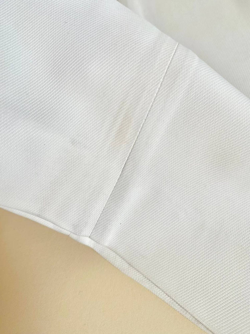 Pantalone bianco latte a vita alta con piega “Byblos”