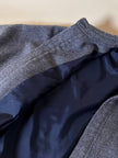 Bomber Yves Saint Laurent in lana grigio mélange con bottoni color cuoio