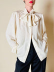 Camicia in seta Jaquard avorio con grande fiocco al collo