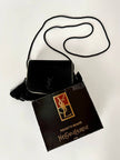 Pochette Beauté vintage Yves Saint Laurent in camoscio nero con nappine e specchio