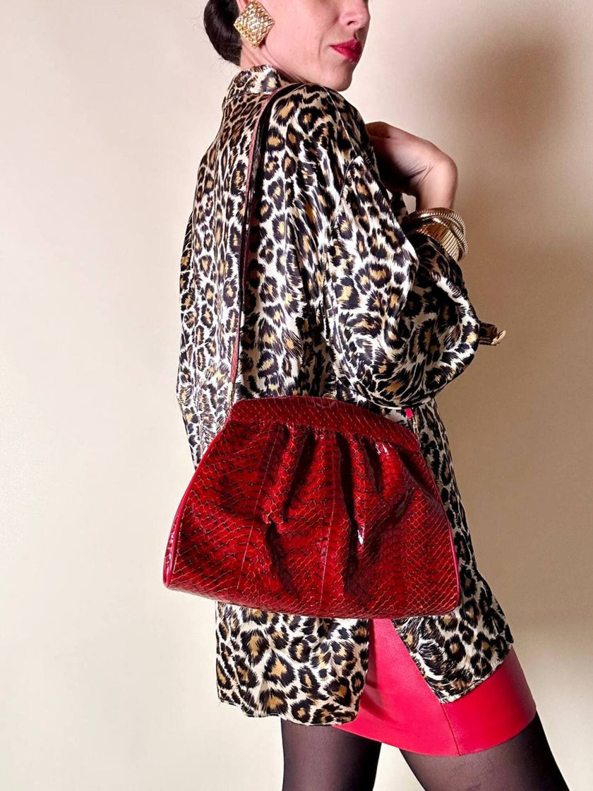 Pochette in whips rossa con tracolla regolabile