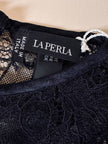 Jumpsuit con staffe in pizzo nero “La Perla”