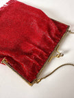 Borsetta vintage di perline rosse con frangia sul fondo