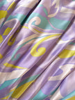 Abito lungo in raso di seta fantasia floreale astratta in nuance pastello “List”
