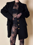 Jumpsuit con staffe in pizzo nero “La Perla”