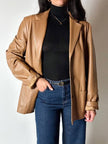 Vintage tan leather jacket with hand-stitched detailing by Claude Collections