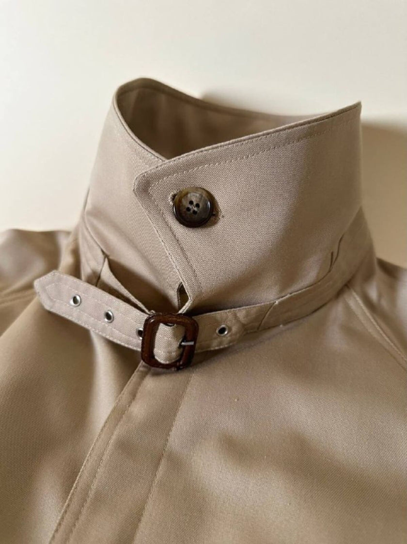 Trench color sabbia con fodera tartan “Idrostop”