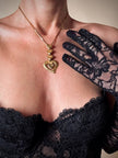 Collana dorata con ciondolo pendente a cuoricini “Yves Saint Laurent”