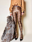 Collant Yves Saint Laurent in lycra fantasia pitone nei toni del beige bronzo e marrone