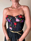 Bustier in cotone nero ricamato con fiori e paillettes e piccole coccarde multicolor “Giorgio Kauten”
