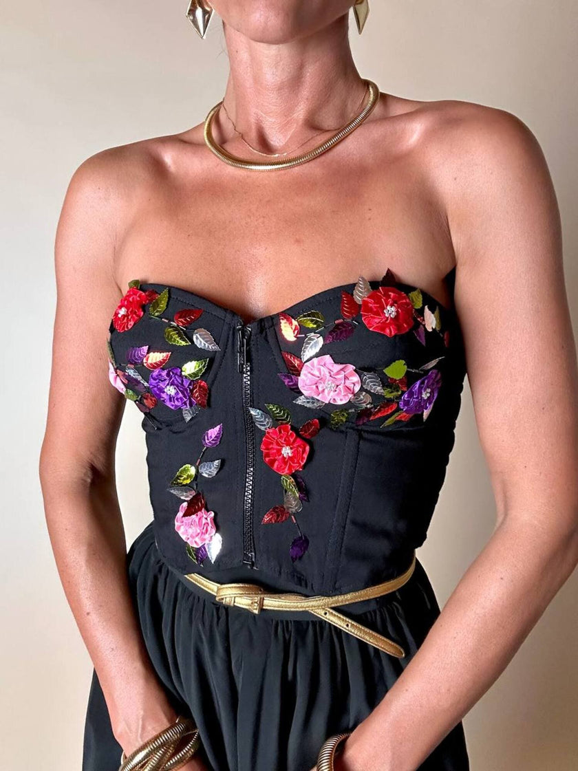 Bustier in cotone nero ricamato con fiori e paillettes e piccole coccarde multicolor “Giorgio Kauten”