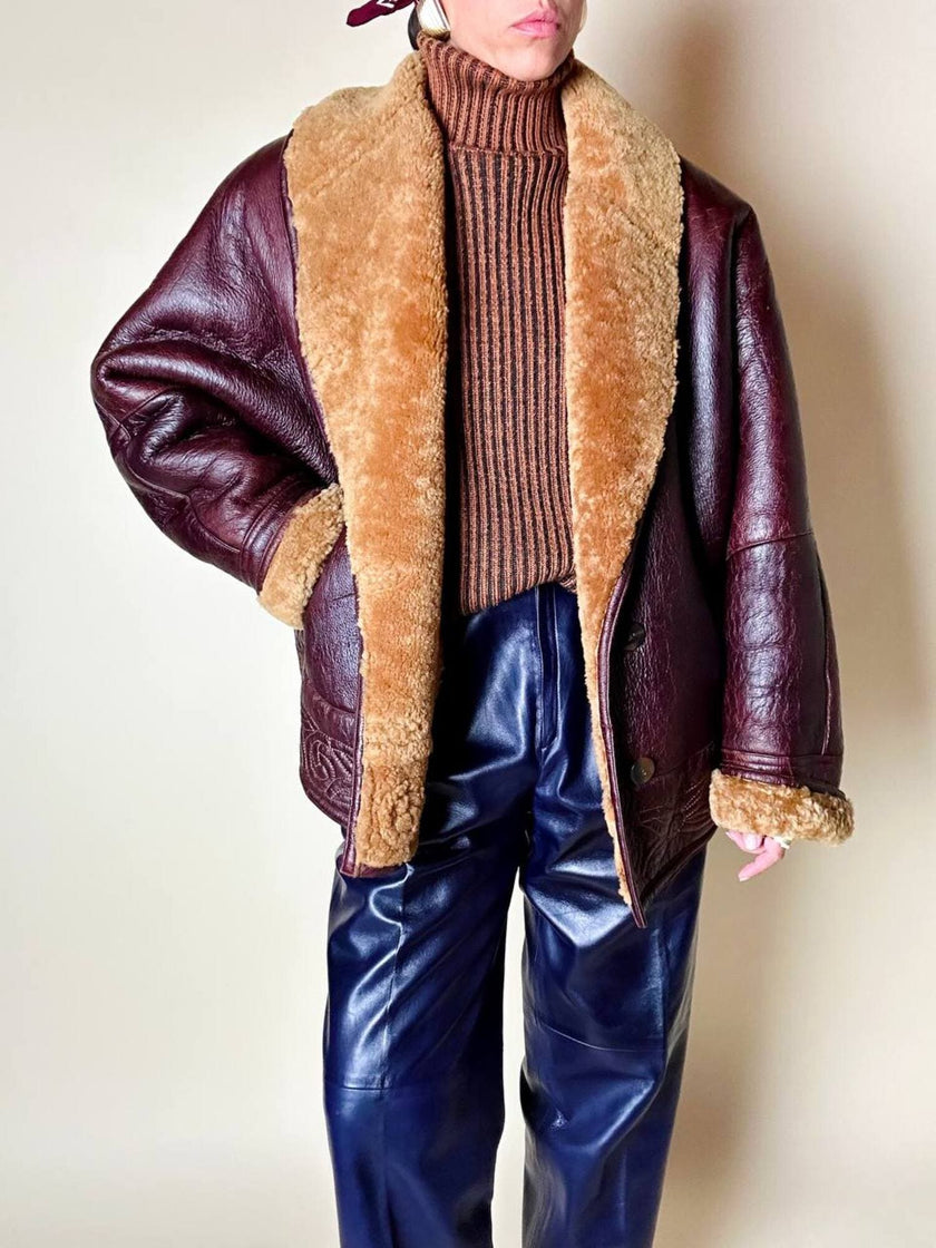 Dolcevita oversize con maxi collo in misto lana a coste larghe ruggine e nero