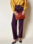Pochette Yves Saint Laurent in saffiano color cuoio con accessorio logato oro