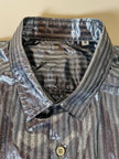 Camicia oversize in lamé argento lavorata a righe