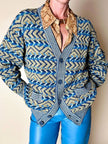 Cardigan Missoni Sport con pattern geometrico e trama tridimensionale nei toni del verde e blu