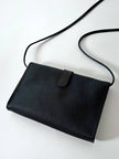Borsa bandoulière vintage Yves Saint Laurent in tessuto plastificato e pelle blu notte