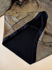 Mini dress oro in tessuto operato con profili neri in raso nero  “Yves Saint Laurent”