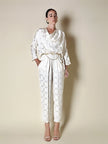 Jumpsuit vintage Spengler Mode in viscosa jacquard avorio con scollo drappeggiato