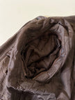 Bomber con maniche rimovibili in pelle color fango “Arpell”
