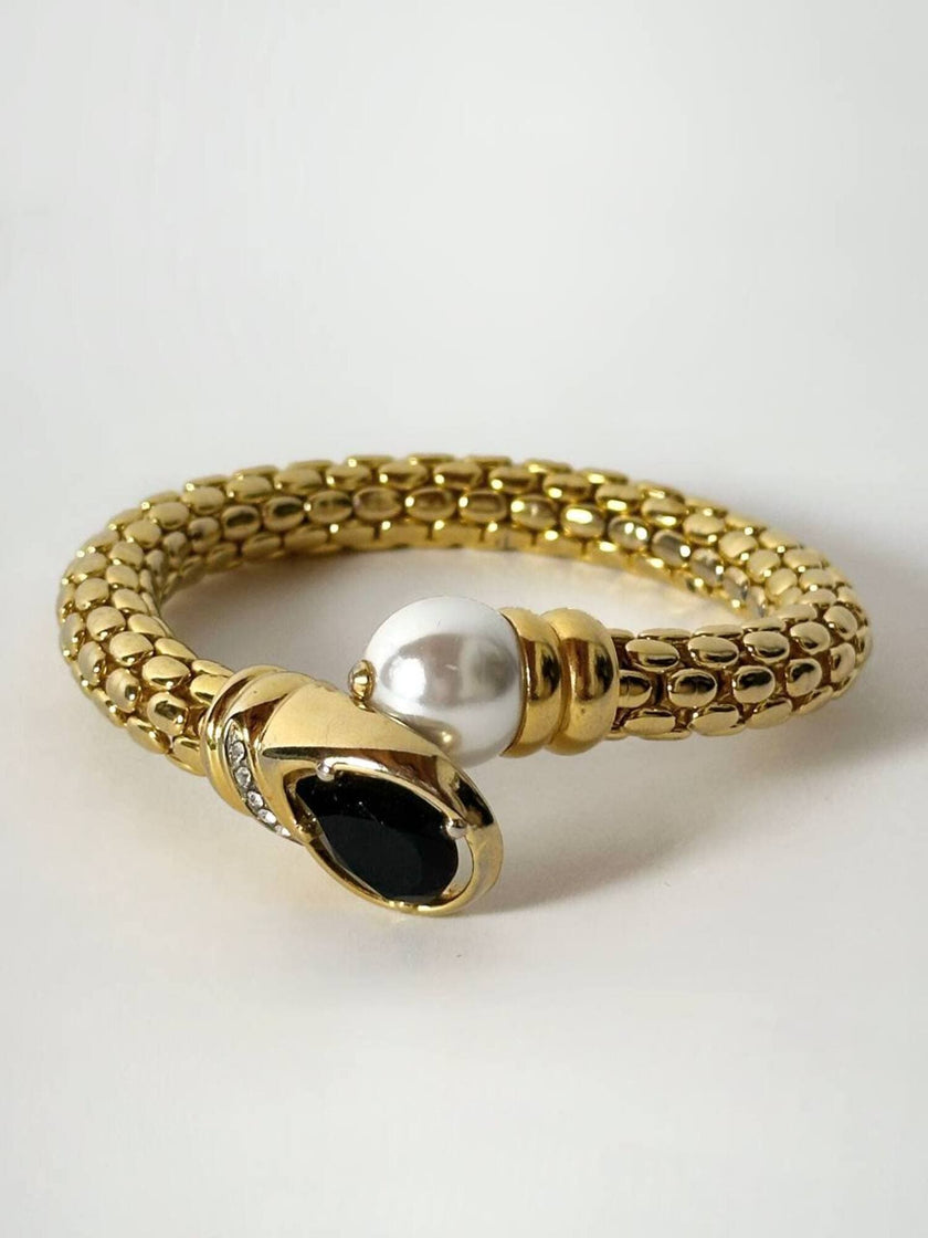 Bracciale vintage in metallo dorato con perla onice nero e cristalli