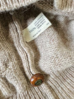 Cardigan Yves Saint Laurent vintage in lana beige con bottoni berlebeck