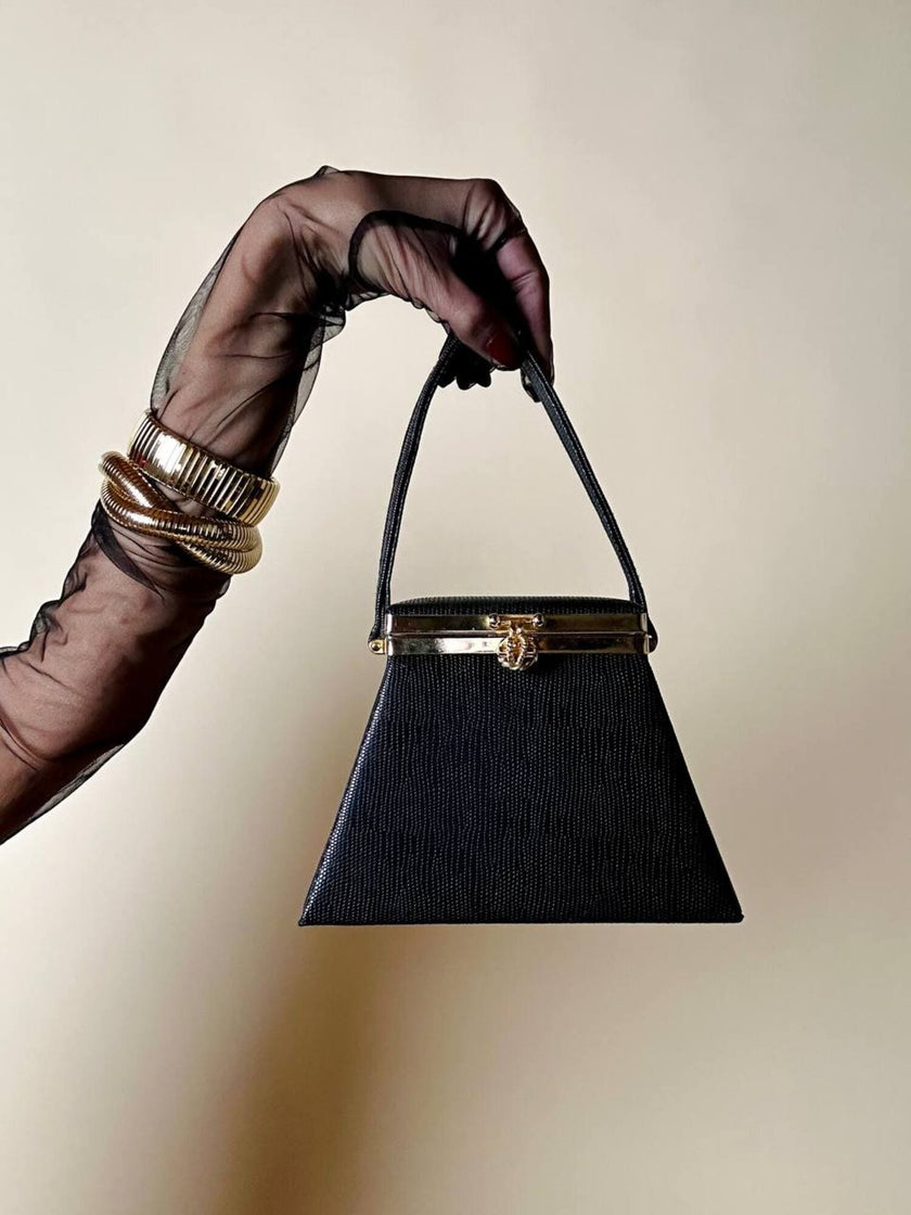 Mini bag a trapezio in ecopelle nera stampa lizard