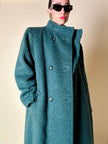 Cappotto doppiopetto in lana bouclé verde bosco con fodera firmata