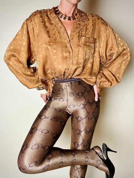 Collant Yves Saint Laurent in lycra fantasia pitone nei toni del beige bronzo e marrone