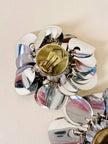 Parure composta da clip e mini bag in paillettes argento