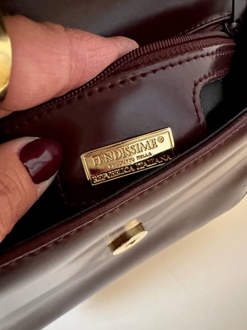 Fendissime handbag in burgundy brushed leather with gold chain jewel handle and detachable shoulder strap