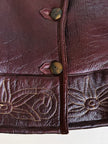 Shearling reverse in pelle liscia marrone castagno con vello caramello e ricamo sul fondo