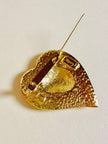 Goldfarbene herzförmige Brosche 